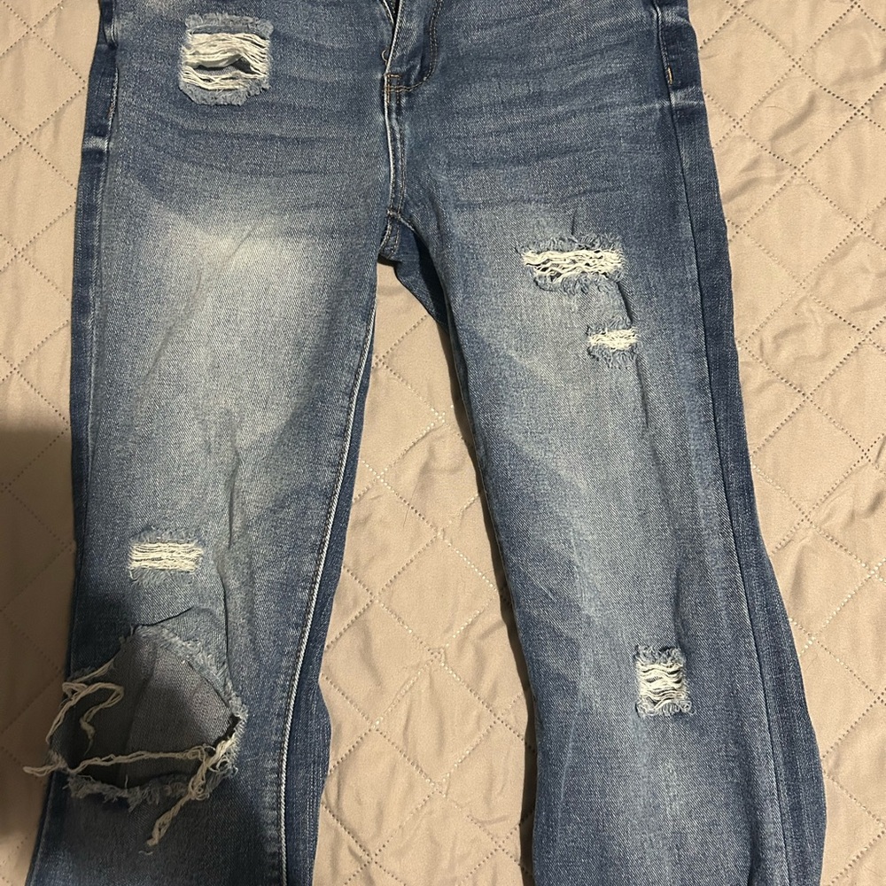 Distressed Blue Jeans